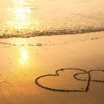 bigstock-Hearts-drawn-on-the-sand-of-a-43411627